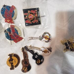Collectible Hard Rock Cafe and Planet Hollywood Pin Set